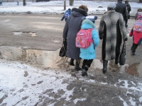 После ремонта дороги "ямки снова стали ямками"