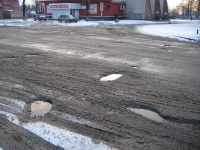 После ремонта дороги "ямки снова стали ямками"