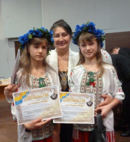 Кременчуцьких двійнят за гарне читання віршів нагородив міністр Кременчуцьких двійнят за гарне читання віршів нагородив міністр